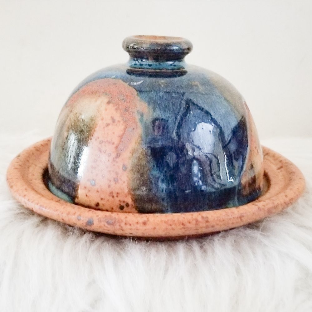Pottery covered plate earth tones with blue
